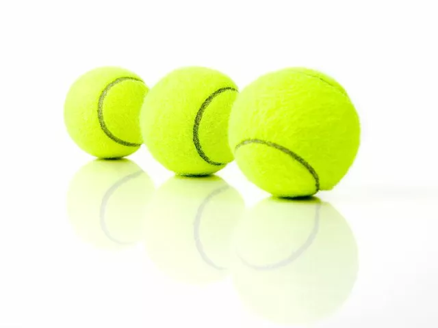 What is the official color of a tennis ball?